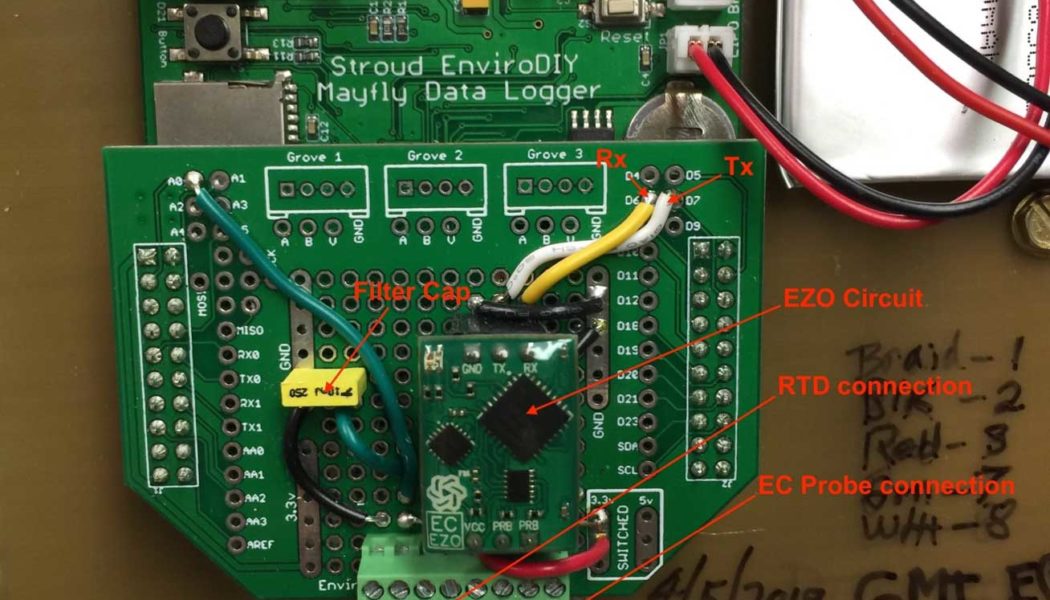 Mayfly circuit board showing ProtoShield with EC components.