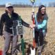 Beth Fisher and University of St. Thomas student Courtney Pelissero install a groundwater monitoring station in a wetland.